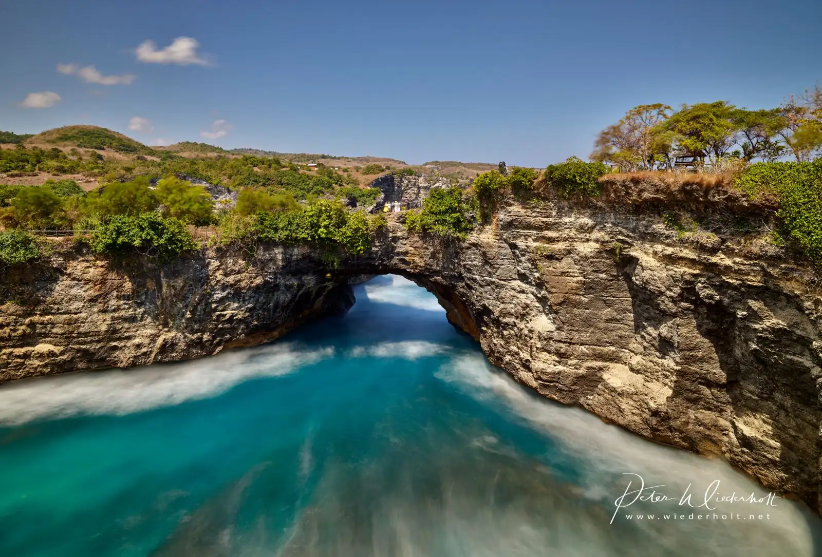 Broken Beach natural arch and turquoise cove on West Nusa Penida